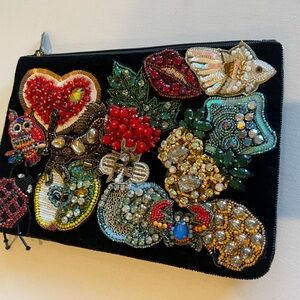 beaded clutch on black velvet background